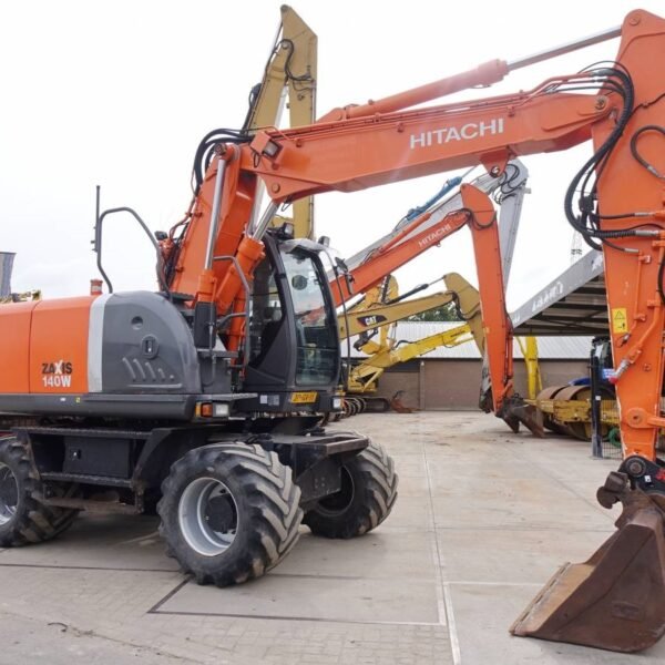 Pelle sur pneus Hitachi ZX140W 2008 – 14,7T – 5410h – Occasion